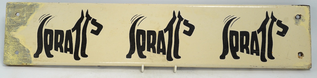 A vintage Spratt’s 'Three Terrier' enamel advertising sign, 51cm wide, 11cm high. Condition - poor to fair